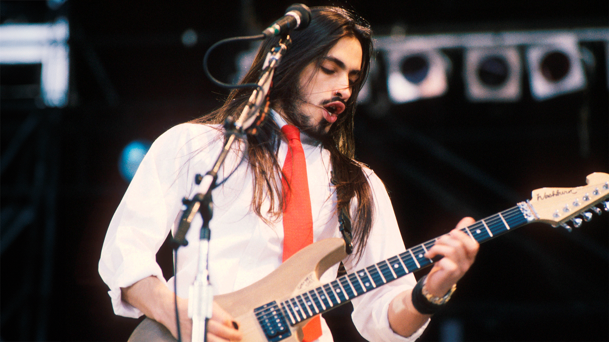 Nuno Bettencourt of Extreme performing at Wembley Stadium, London, during the The Freddie Mercury Tribute Concert for AIDS Awareness, 20th April 1992.