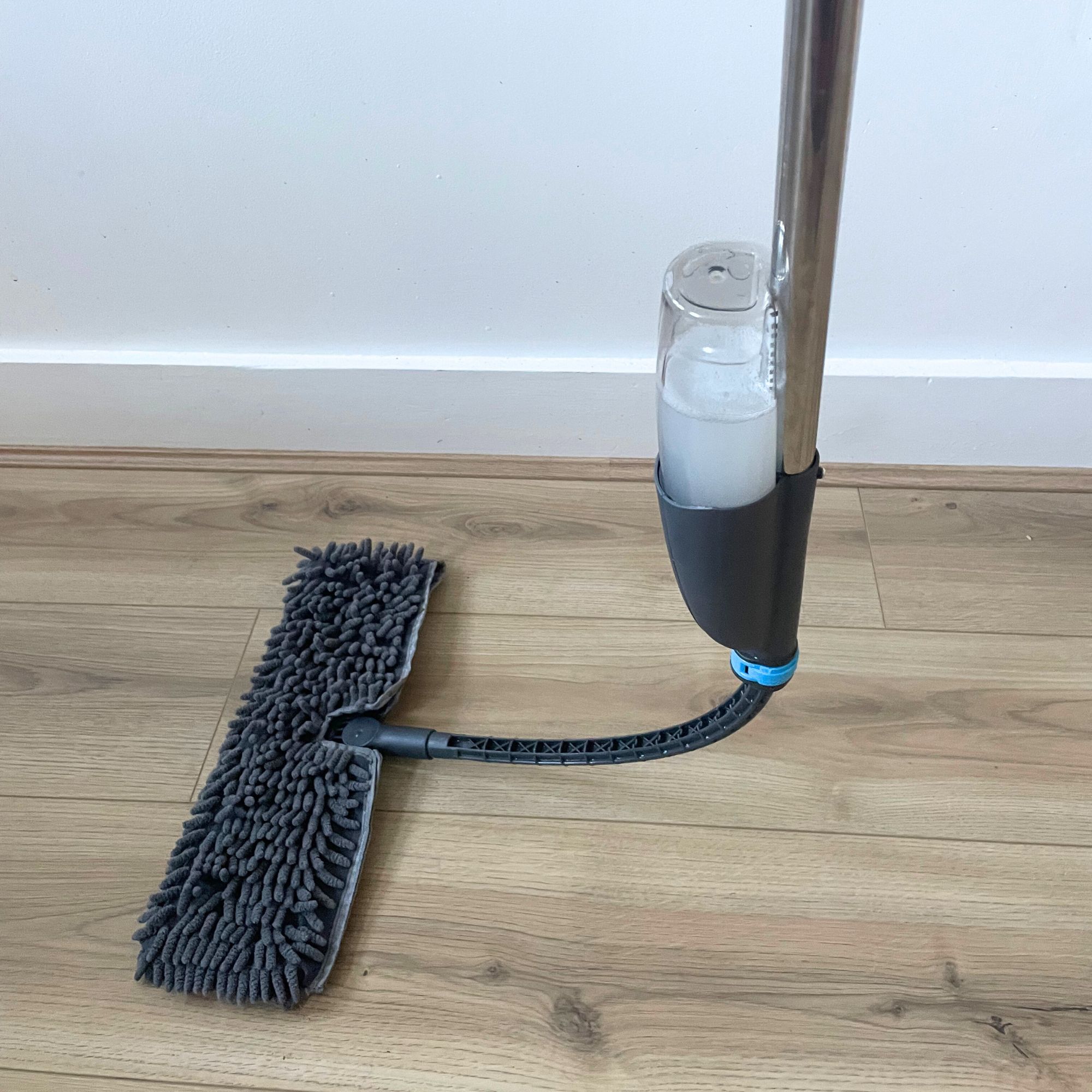 Minky Flexi Spray Mop bending on wood-effect flooring
