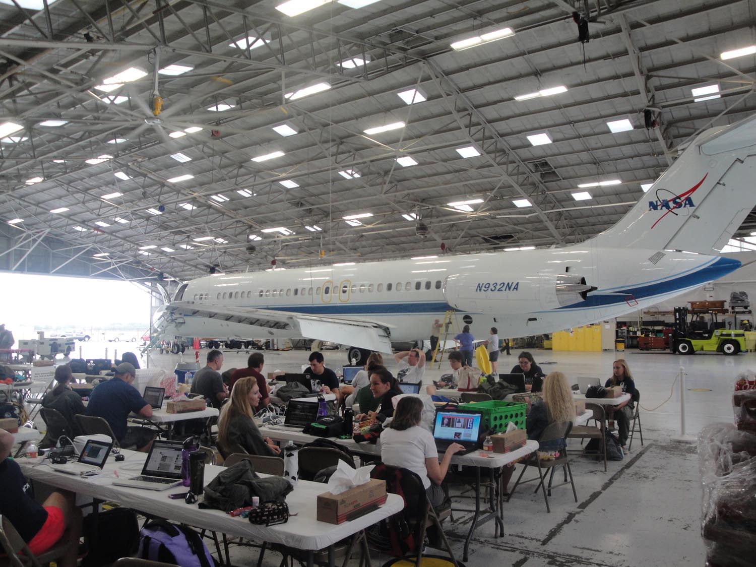 Teams of students and teachers prepare their experiments for weightless tests inside a NASA hangar at Ellington Field in Houston during NASA's Microgravity University Program flight week on July 17, 2013. Fourteen teams were selected to fly experiments in weightless conditions aboard a modified jet as part of NASA's Reduced Gravity Education Flight Program.