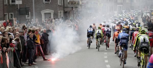 Flares provided an extra hazard for the peloton to avoid
