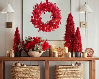 Red Christmas decorations on table