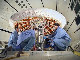 Engineers checked out the Inflatable Reentry Vehicle Experiment after the successful completion of an inflation system test. The IRVE-3 is scheduled to launch on a sounding rocket on July 21, 2012.