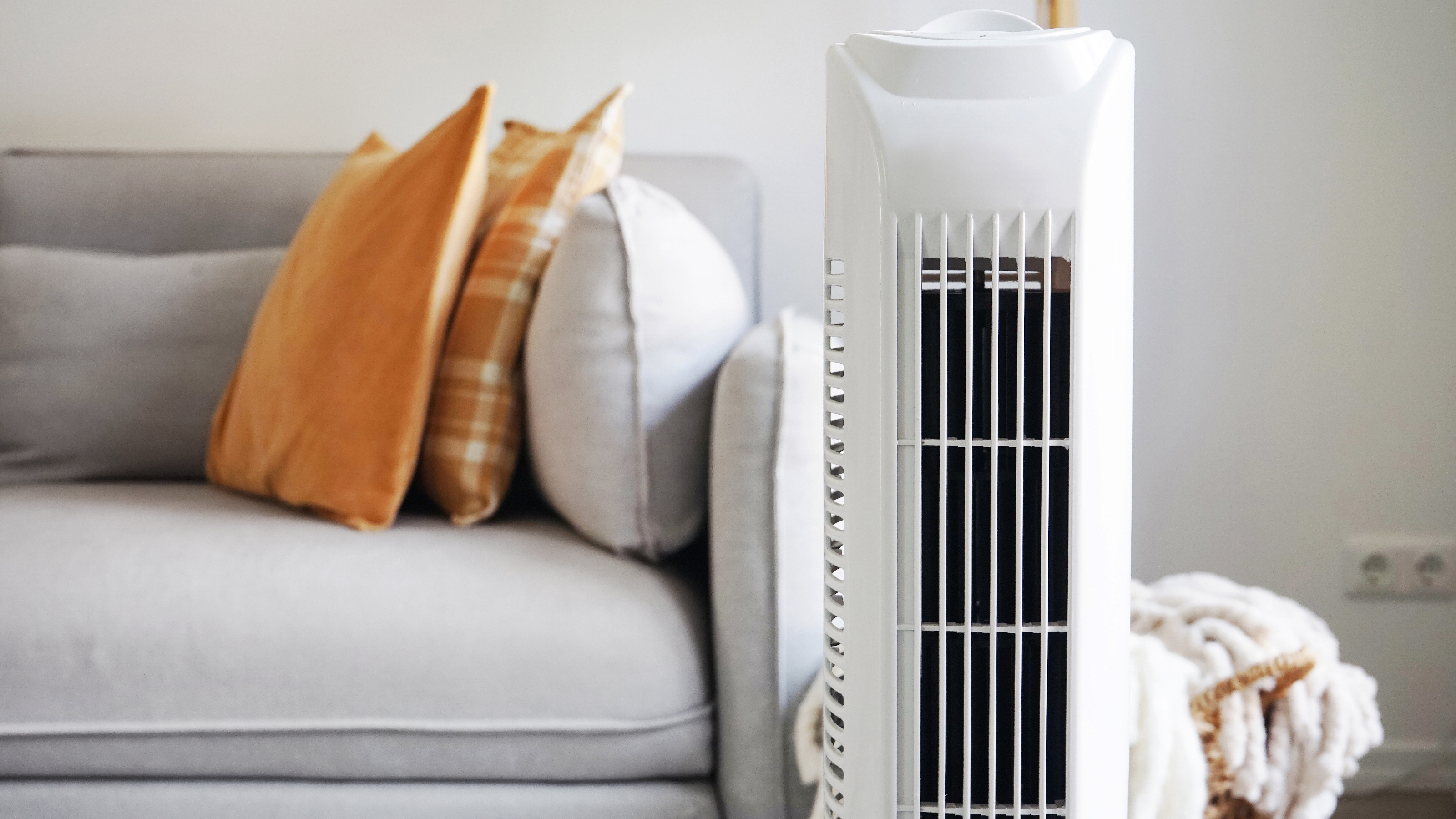 tower fan in a living room - Kate Korolova - GettyImages-2228518276