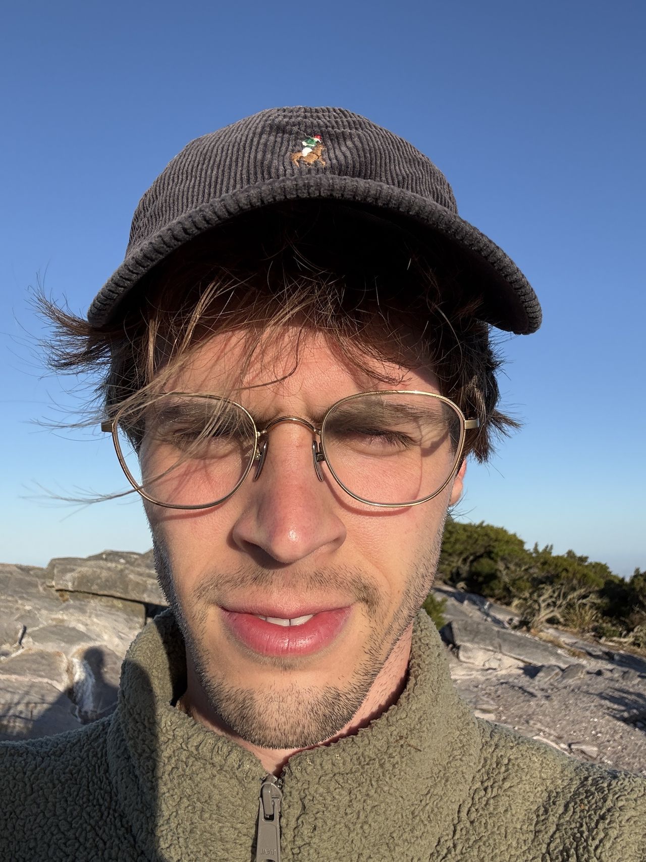 Assorted images for a comparison between Clean Up in iOS 26 and iOS 27