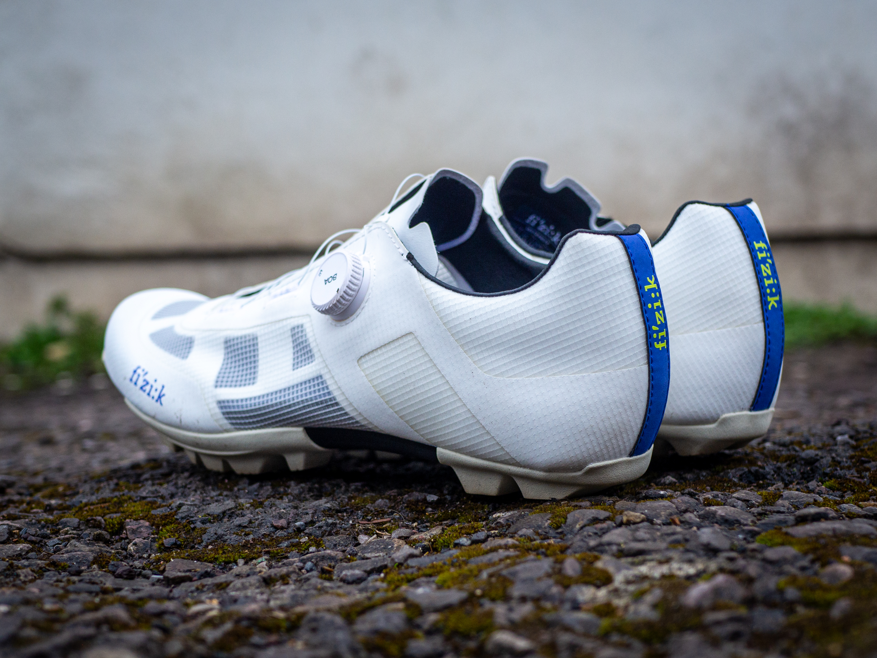 A white pair of Fizik Vento Proxy gravel shoes