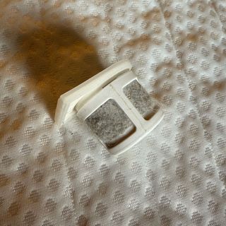 Mattress vacuum filter filled with dust on matttress