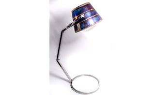 Exhaust Lamp, made from an exhaust from a BAE 146, stands over 6 ft tall