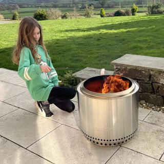 The Solo Stove Bonfire 2.0 firepit being tested