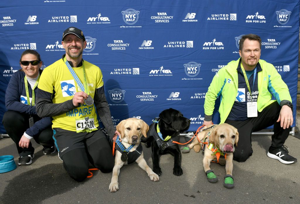 Thomas Panek with Westley, Waffle, and Gus.