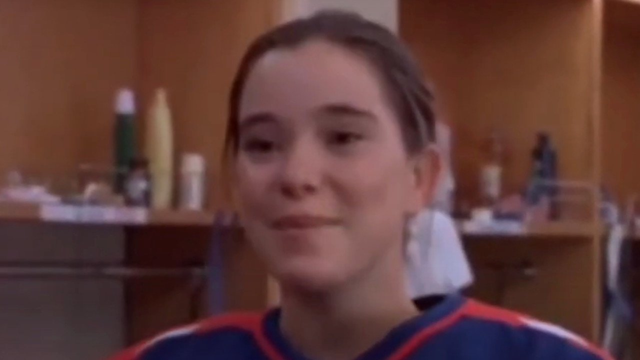 Connie stands up and says where she's from in Mighty Ducks 2.