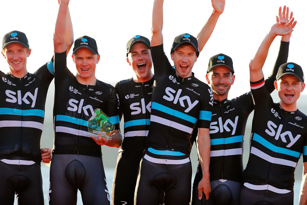 Team Sky riders celebrate winning stage 1