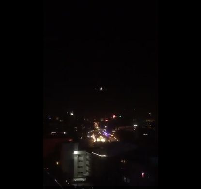 A screenshot from Twitter shows a Turkish military plane flying low over the capital city of Istanbul.