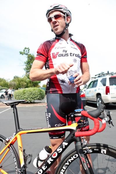 Ben Day (Fly V Australia) heads out on his shiny new De Rosa with a different black and orange paint scheme.