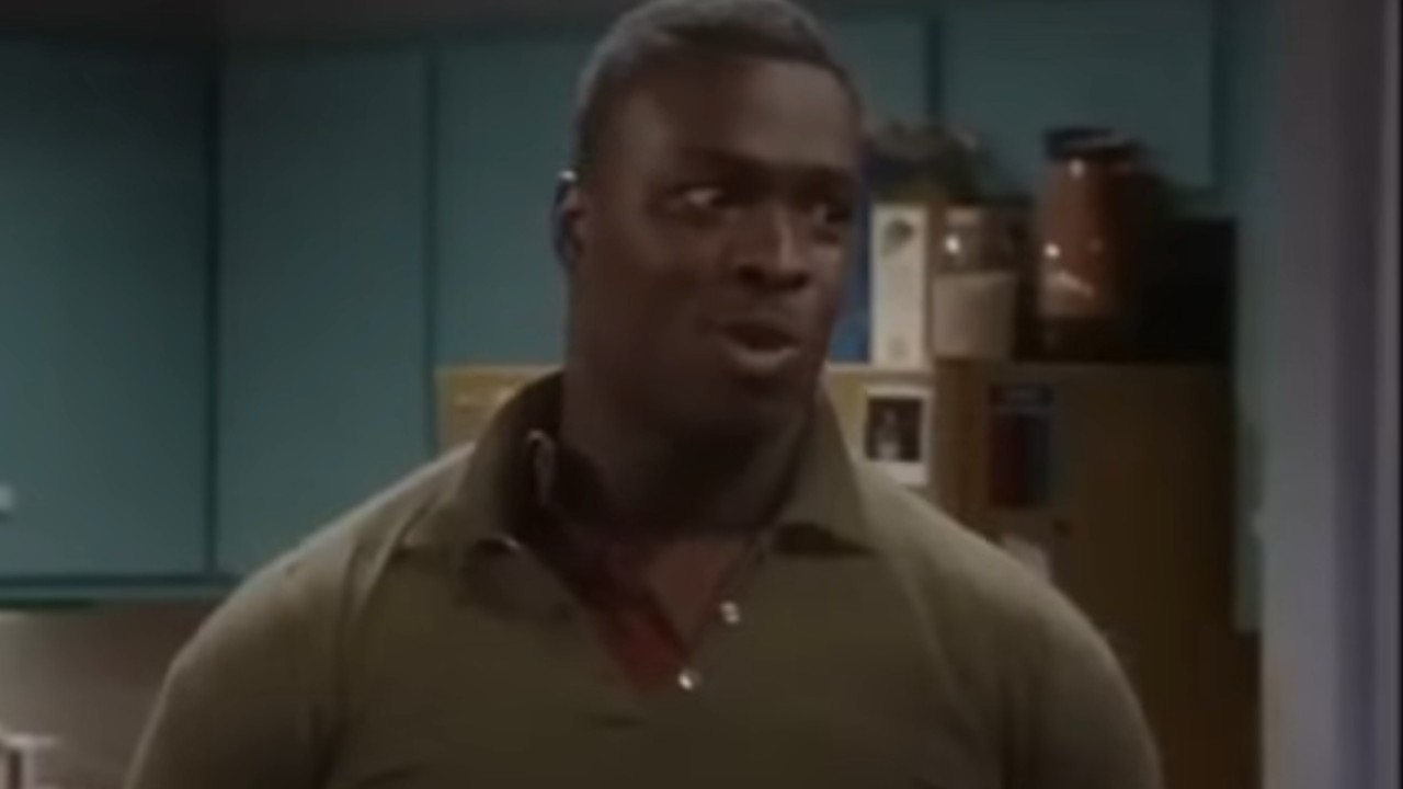 Reginald Ballard wearing Martin's shirt on Martin
