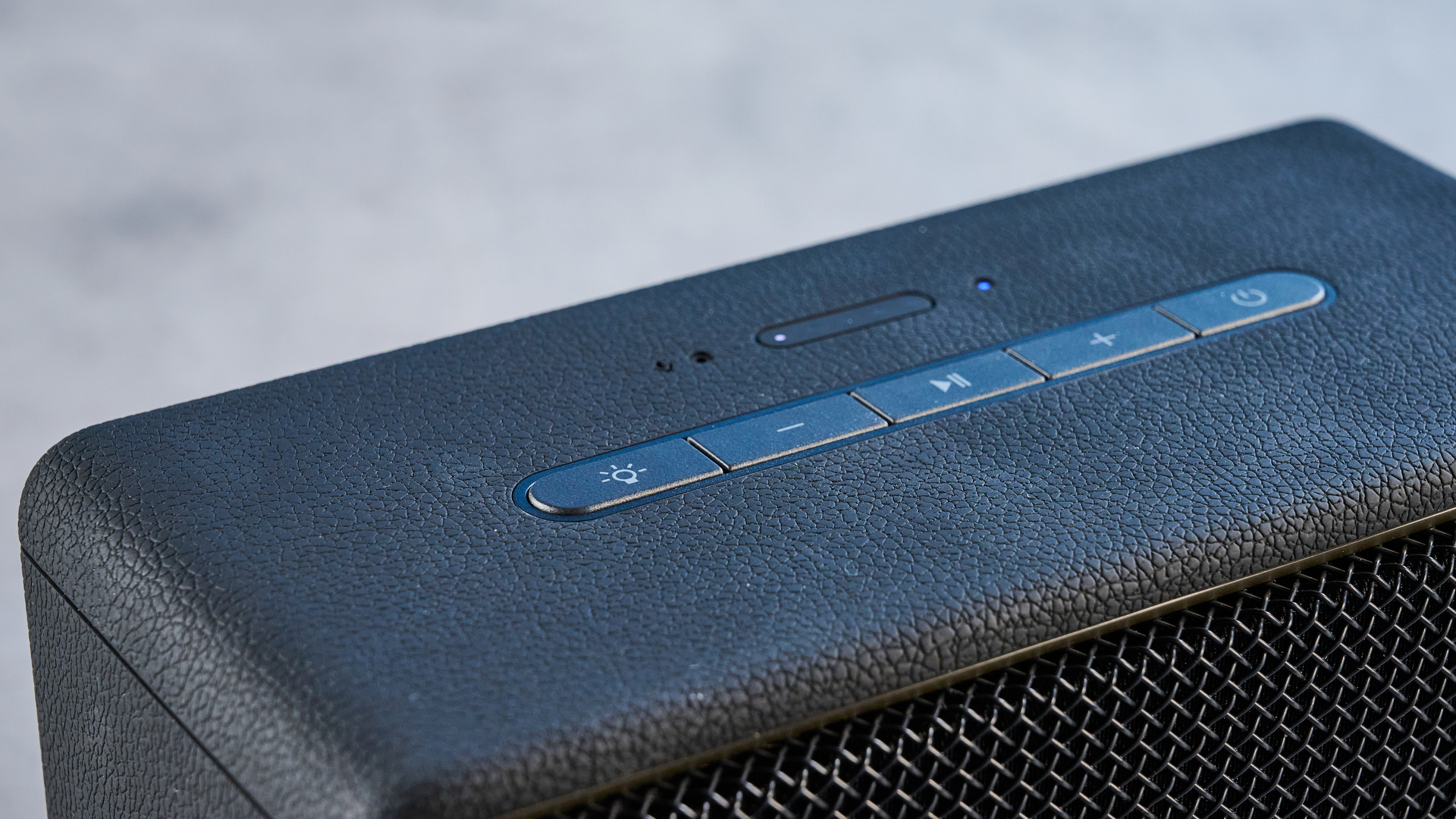 A black Edifier ES60 Bluetooth speaker