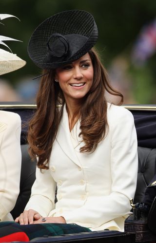 Kate Middleton wearing a white alexander mcqueen dress to trooping the colour in 2011