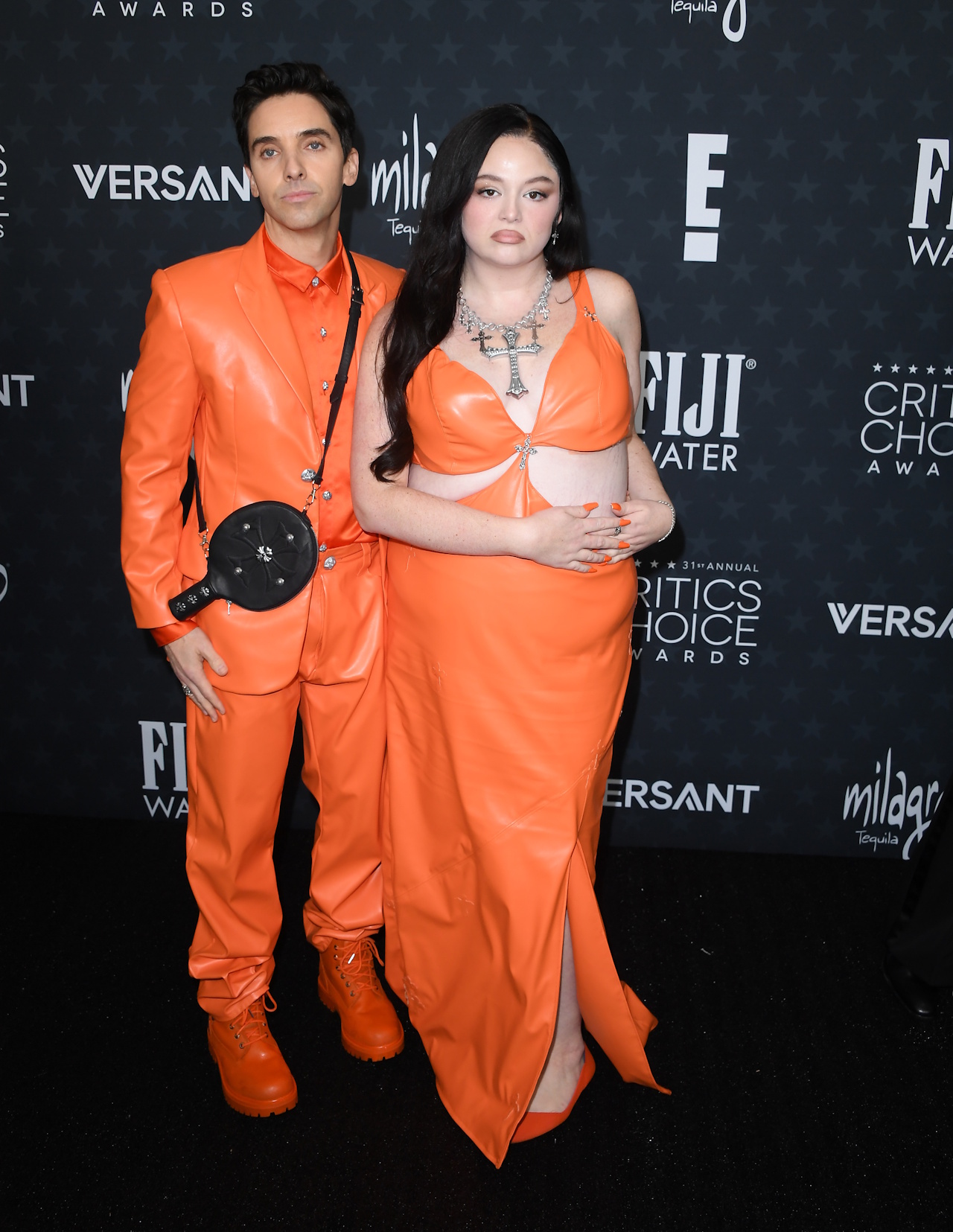 Paul W. Downs and Megan Stalter arrive at the 31st Annual Critics Choice Awards at Barker Hangar on January 04, 2026 in Santa Monica, California.