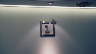 OnePlus logo on a wall