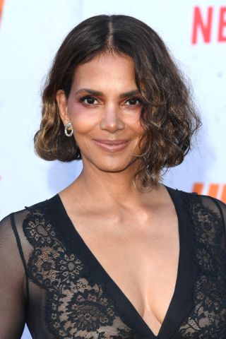 Halle Berry is pictured with a curly bob whilst arriving at the Los Angeles Premiere Of Netflix's "The Union" at The Egyptian Theatre Hollywood on August 12, 2024 in Los Angeles, California.