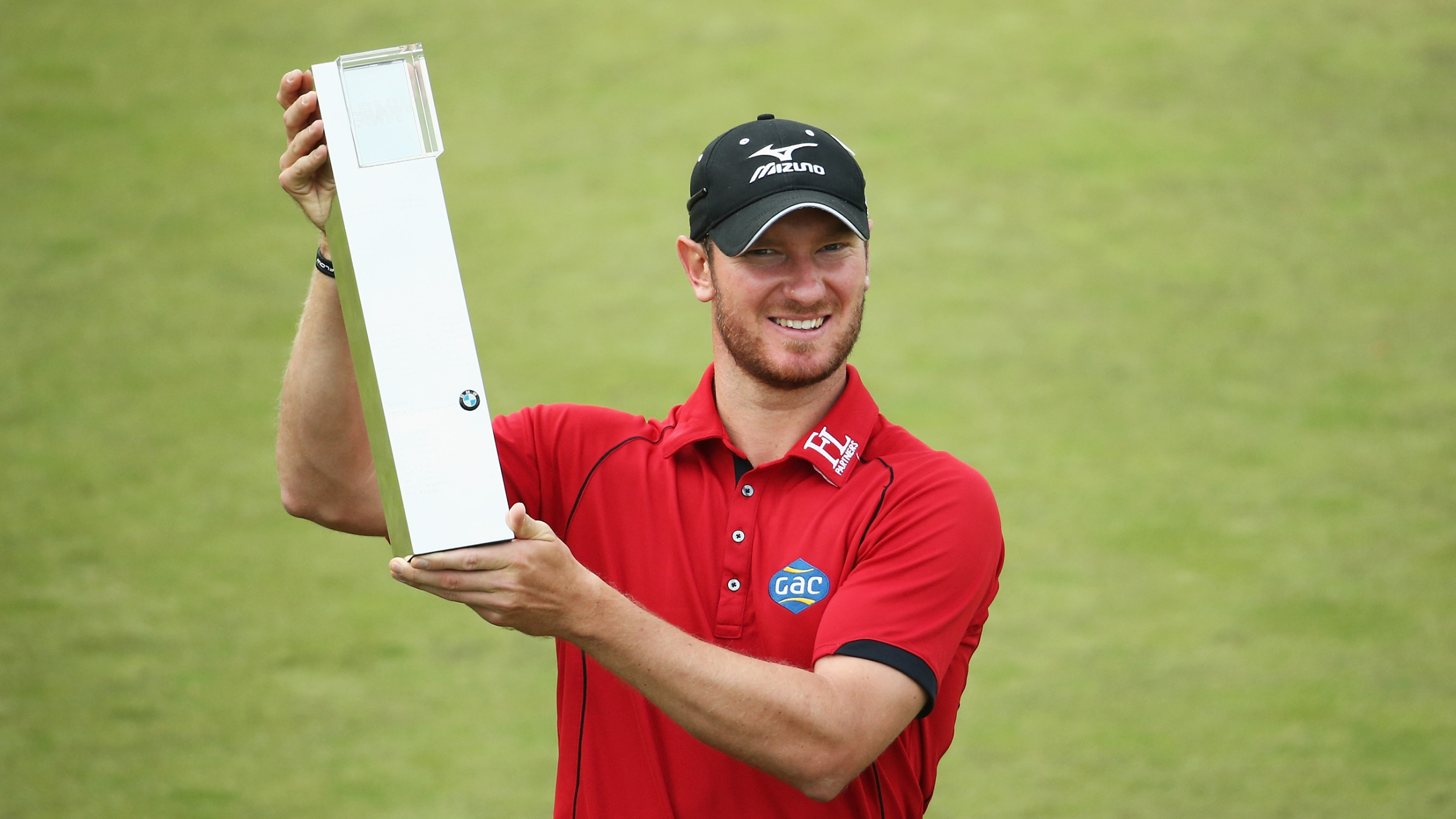 Chris Wood with the BMW PGA Championship trophy