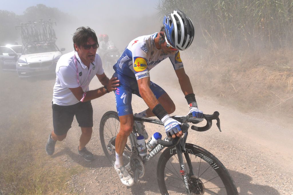 SIENA ITALY AUGUST 01 Davide Bramati of Italy Sports Director of Deceuninck QuickStep Julian Alaphilippe of France and Team Deceuninck QuickStep Mechanical Problem during the Eroica 14th Strade Bianche 2020 Men a 184km race from Siena to SienaPiazza del Campo StradeBianche on August 01 2020 in Siena Italy Photo by Tim de WaeleGetty Images