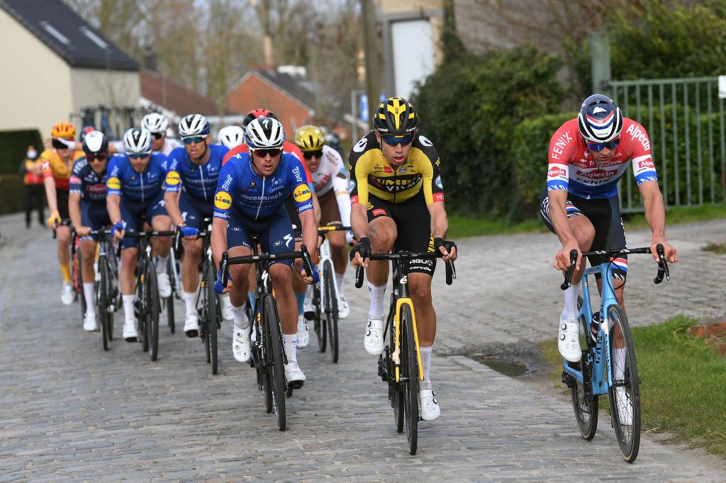 HARELBEKE BELGIUM MARCH 26 Yves Lampaert of Belgium and Team Deceuninck QuickStep Wout Van Aert of Belgium and Team Jumbo Visma Mathieu Van Der Poel of Netherlands and Team AlpecinFenix during the 64th E3 Saxo Bank Classic 2021 a 2039km race from Harelbeke to Harelbeke Tiegemberg Cobblestones E3SaxobankClassic on March 26 2021 in Harelbeke Belgium Photo by Tim de WaeleGetty Images