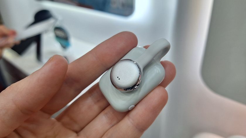 SwitchBot AI MindClip in writer's hand