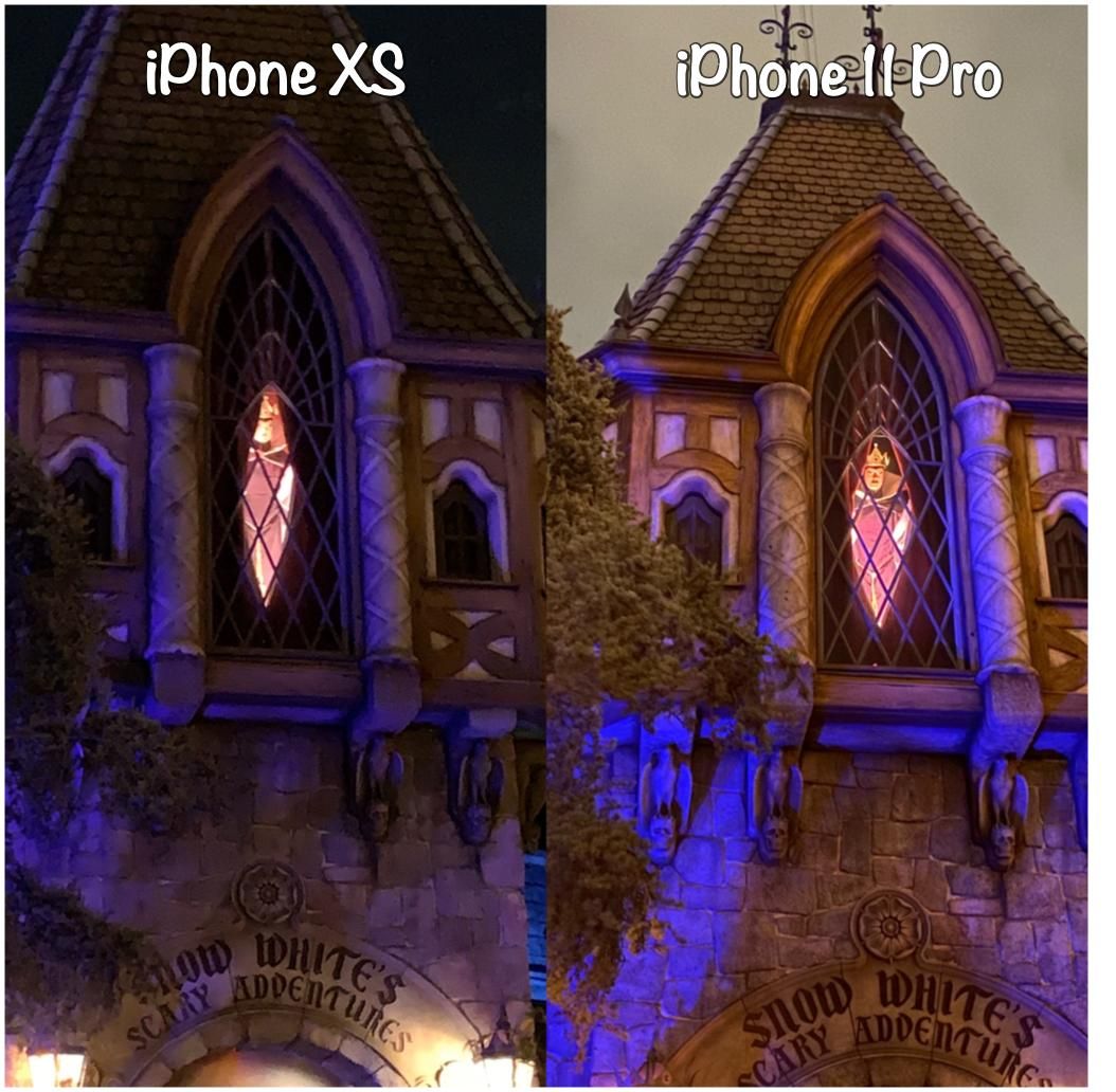 Evil Queen peeking out the window at Snow White's Scary Adventures