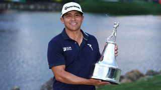 Kurt Kitayama with the trophy after his win in the Arnold Palmer Invitational