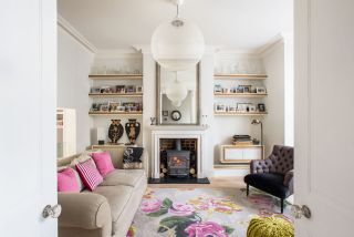 light coloured living room with pink accents photographed by polly eltes