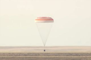 Returning from the International Space Station, Russia's Soyuz MS-19 lands on the steppe of Kazakhstan with cosmonauts Anton Shkaplerov and Pyotr Dubrov of Roscosmos and NASA astronaut Mark Vande Hei, on Wednesday, March 30, 2022.
