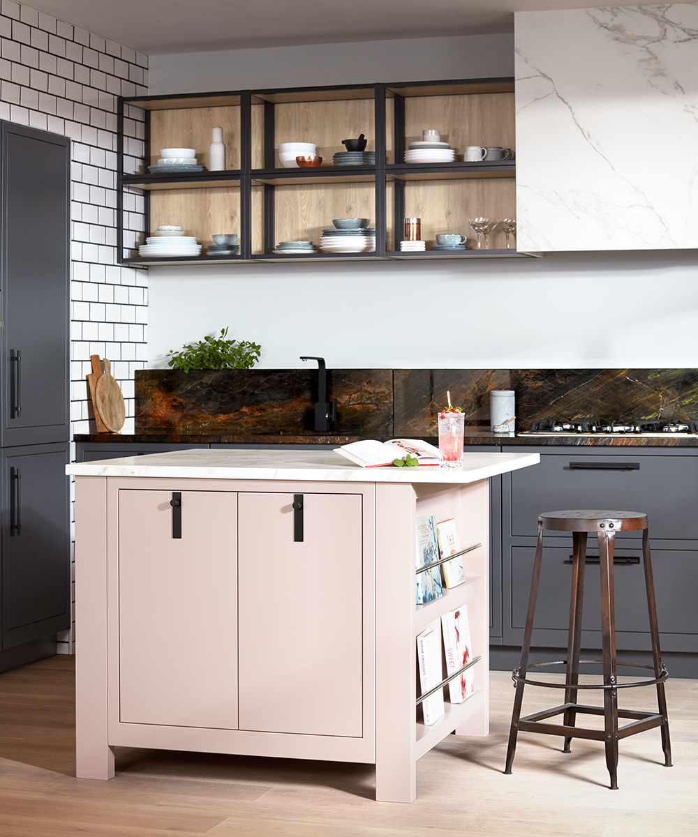 Colorful kitchen island ideas shown here in pale blush pink in a blue-gray and white scheme.