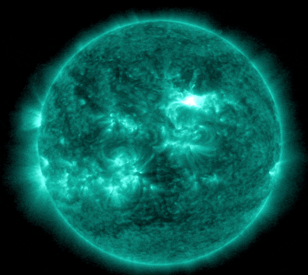 gif animation showing the X flare from this morning as a bright spark of light on the sun.