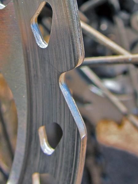 Look closely and you can see the aluminum core hiding between the two stainless steel sheets on the new Shimano Deore XT ICE Tech rotor. Shimano will offer the new rotors in both Center Lock and six-bolt fitments.