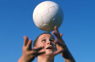 boy catching a ball
