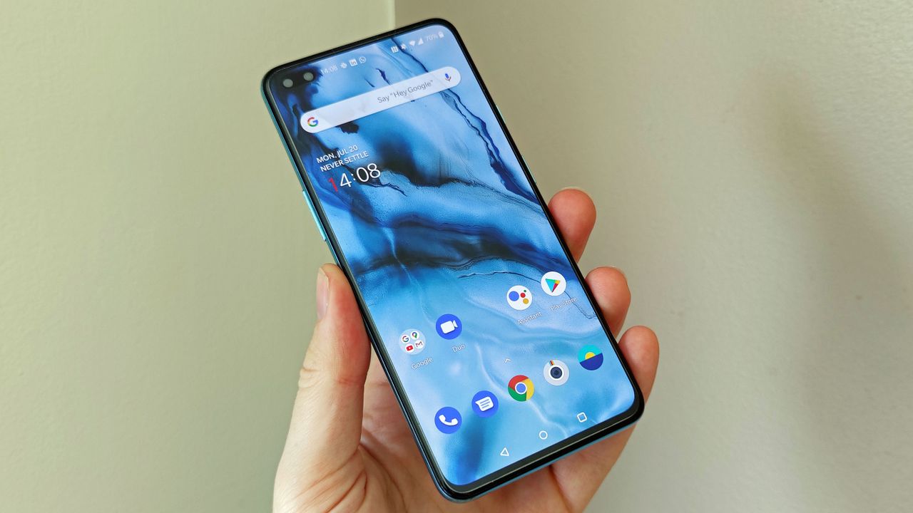 A OnePlus Nord from the front, in someone's hand