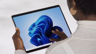 A person using the Microsoft Surface 8