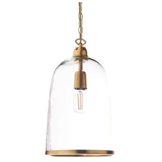 A glass-domed pendant light with brass edging