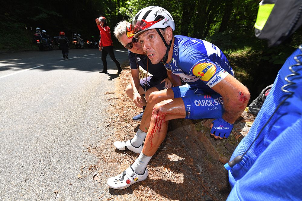 Philippe Gilbert (Quick-Step Floors) sits down for a moment before restarting his race after a crash