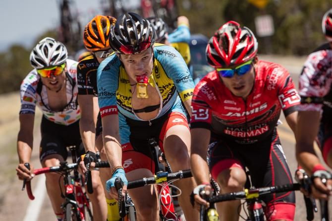 Rob Britton (Smartstop) has a snack on the climb