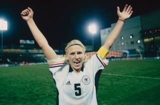 German footballer Doris Fitschen celebrates her team's victory in the Group B match between Germany and Mexico at the 1999 FIFA Women's World Cup, held at the Civic Stadium, Portland, Oregon, 24th June 1999. Germany won 6-0. (Photo by Lutz Bongarts/Bongarts/Getty Images)