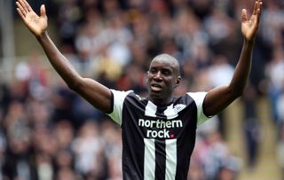 Demba Ba celebrates after scoring for Newcastle United against Blackburn Rovers in September 2011.