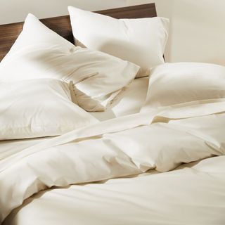 Luxe Sateen Sheet Set on a bed.