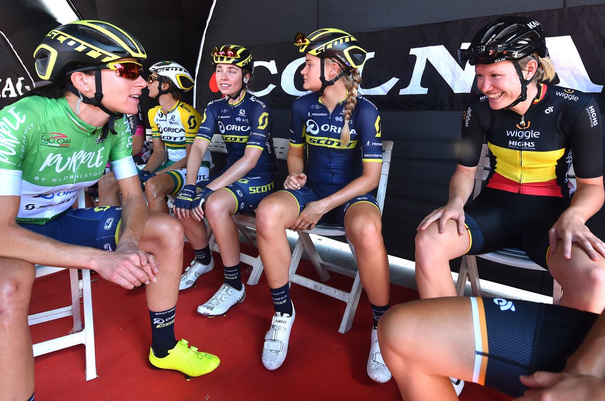 The riders enjoy a laugh and chat before the stage