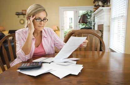 Woman paying bills