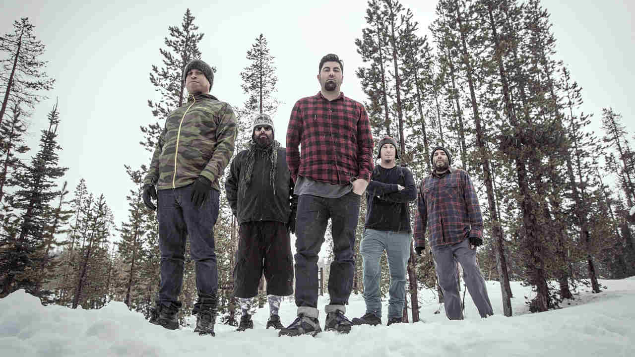 Deftones posing for a photograph in 2016