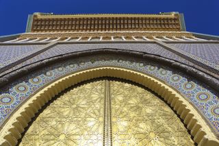 A golden gate in front of the Royal Palace in Fez, Morocco