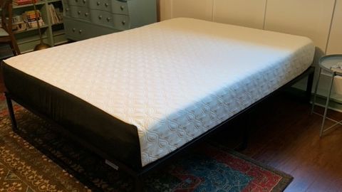 The Cocoon by Sealy Chill Memory Foam Mattress on a bed frame in our tester's bedroom