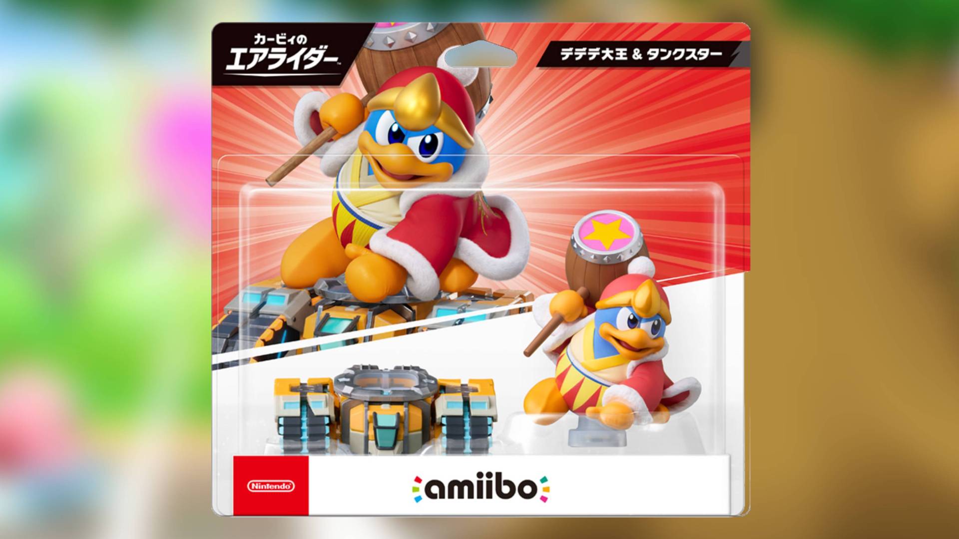 Image of the King Dedede Kirby Air Riders amiibo sitting on a blurred Kirby Air Riders screenshot.