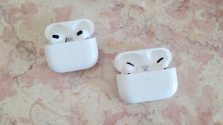 The AirPods 3 facing off against the AirPods Pro for our AirPods 3 vs AirPods Pro comparison